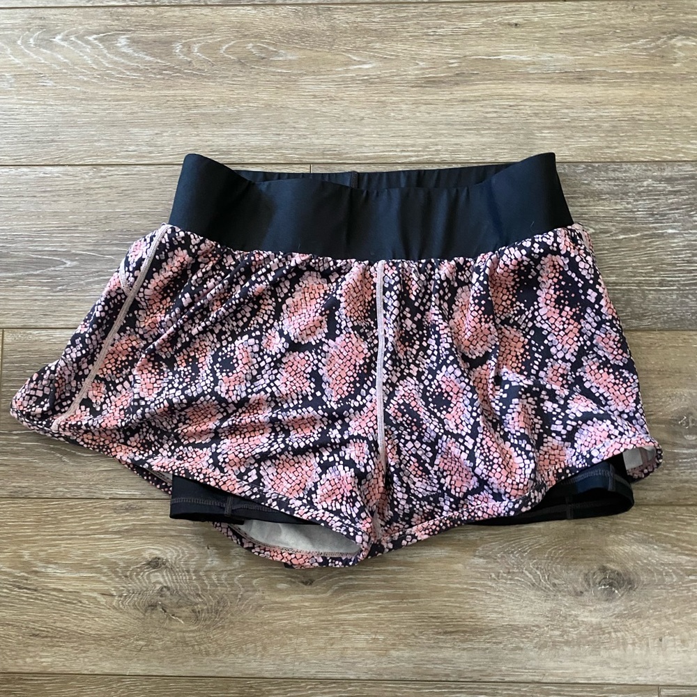 Colorful Fabletics shorts size medium and used quite a bit but in great shape